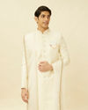 alt message - Manyavar Men Pearled Ivory White Medallion Patterned Sherwani Set image number 0